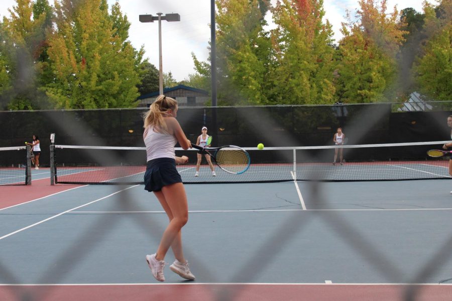 Senior+Emma+Bonardi+plays+a+doubles+match.+