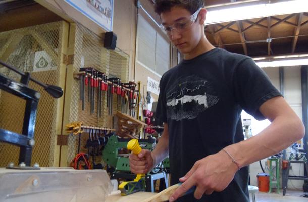Senior Jonathan Bobrovitch works on a project in Woodtech
