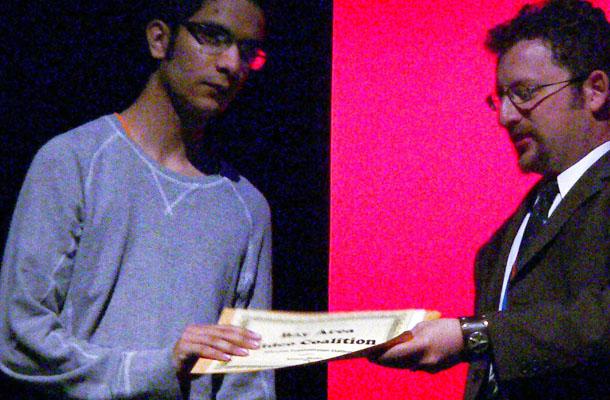 Junior Vikram Bhaduri receives his scholarship at the LAUFF 7 film festival.