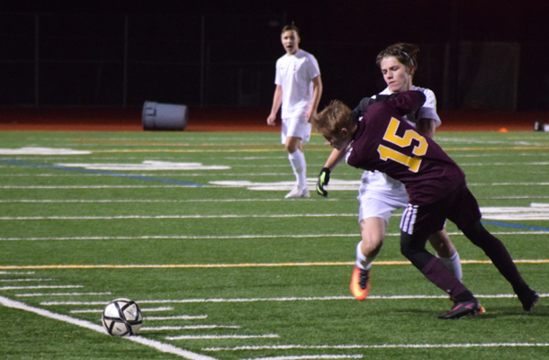 [PLAYER] wrestles the ball away from Las Lomas.