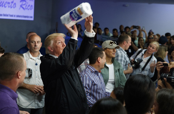 President Trump throws paper towel rolls into the crowd in Puerto Rico