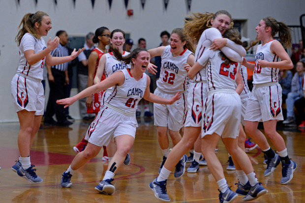 The Campolindo girls varsity basketball team celebrate their win over St. Mary's during their NorCal Division III girls basketball championship game at Campolindo High School in Moraga, Calif. on Saturday, March 18, 2017. Campolindo defeated St. Mary's 78-56. (Jose Carlos Fajardo/Bay Area News Group)