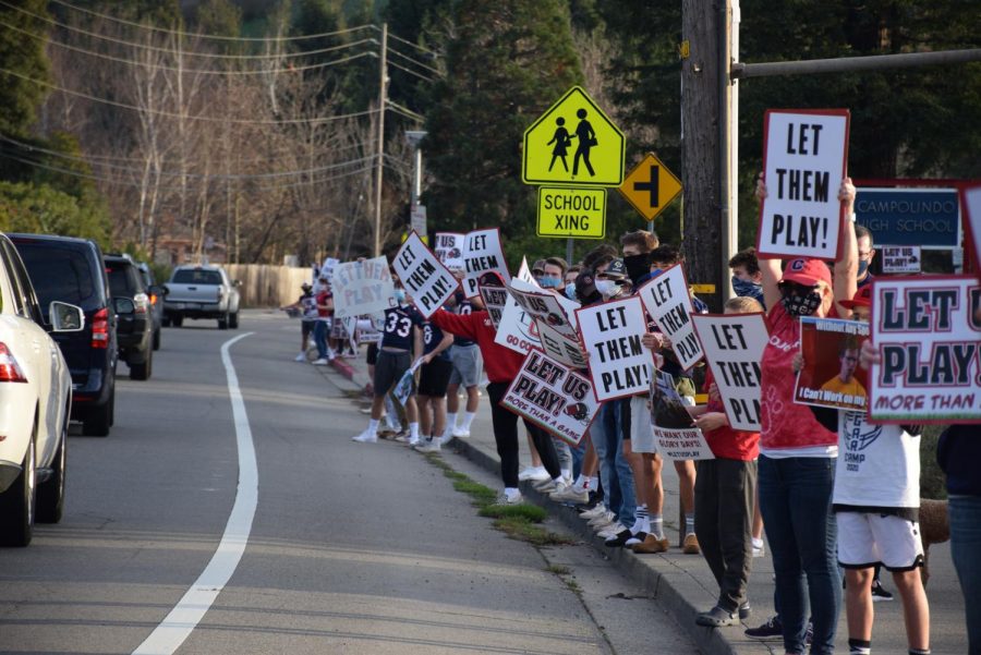 Student athletes rally for the reopening of sports practices during the pandemic in front of Campolindo Highschool.