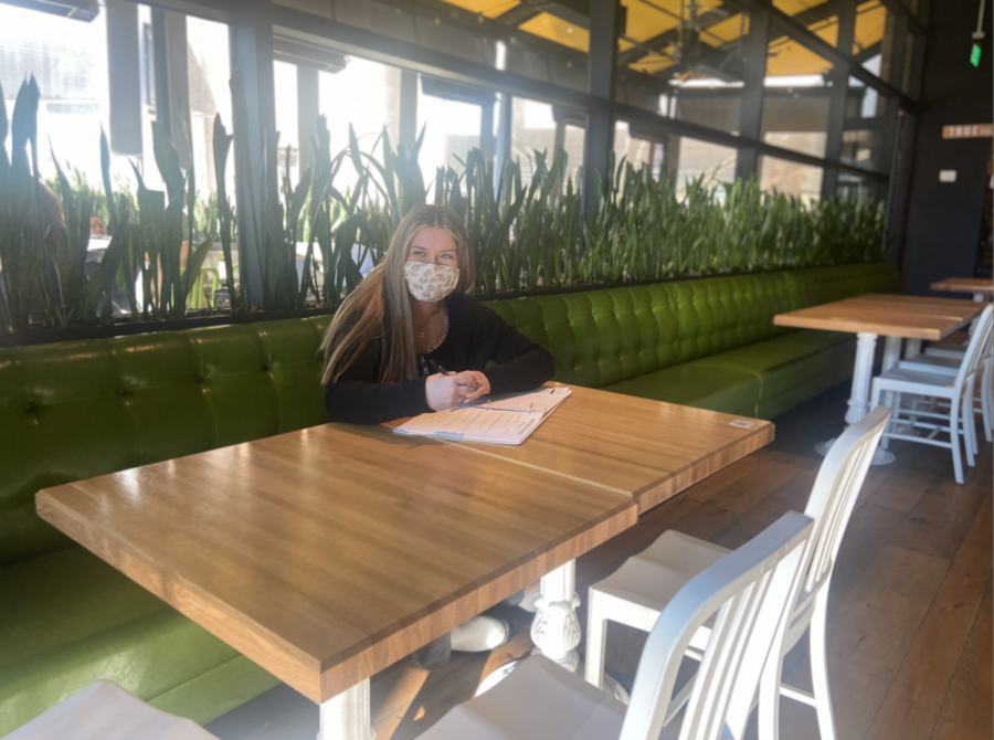 Sophomore Maya Gottfried begins her work day at TrueFood Kitchen in Walnut Creek.