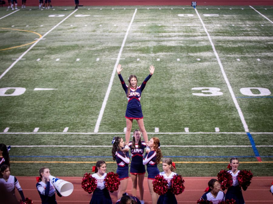 Campo cheerleaders cheering for the 1st home game against Aptos.