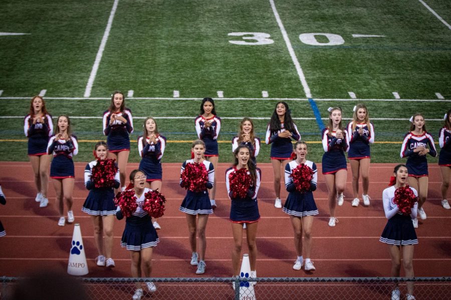 Campo cheerleaders cheering for the 1st home game against Aptos.