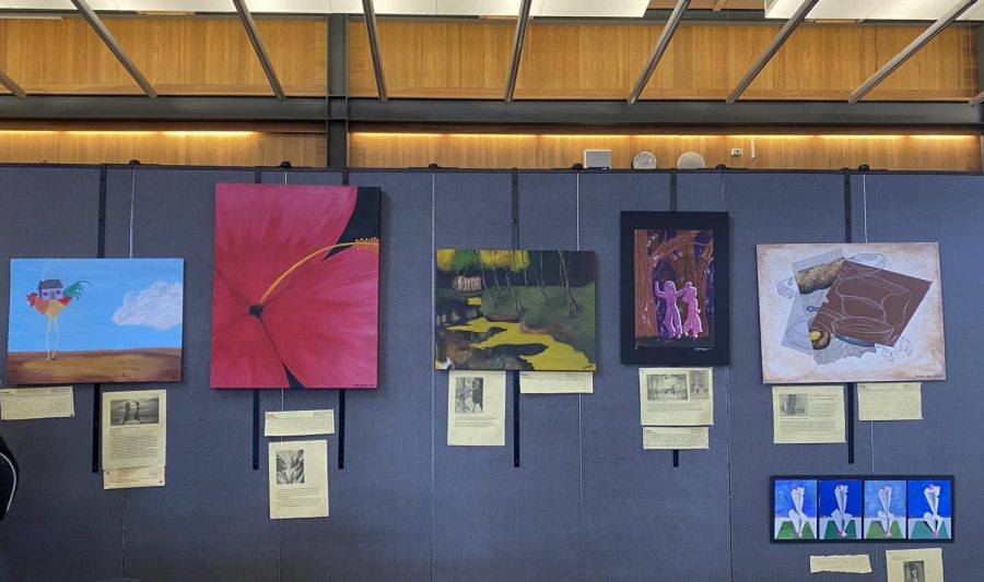 Library display of Art 2 and ADV Honors students work.