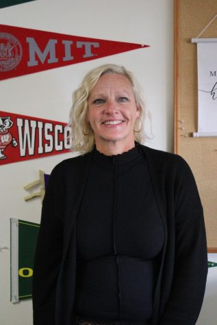 Thayer smiles in her office.