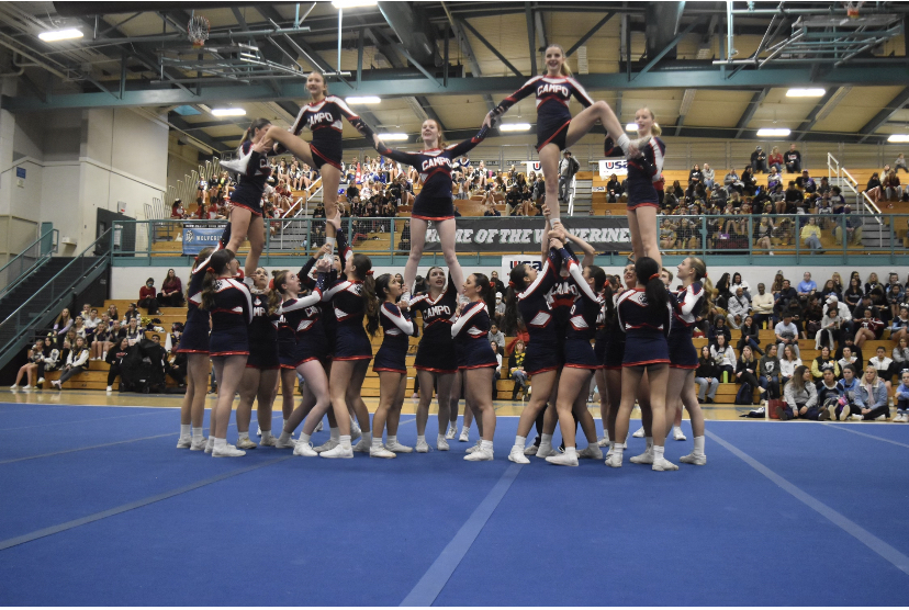 The Competitive Cheer Team performs their pyramid during the routine.