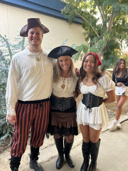 Ryan Mingham, Lyenne Denny and Senior Meliana Calica in their pirate costumes.