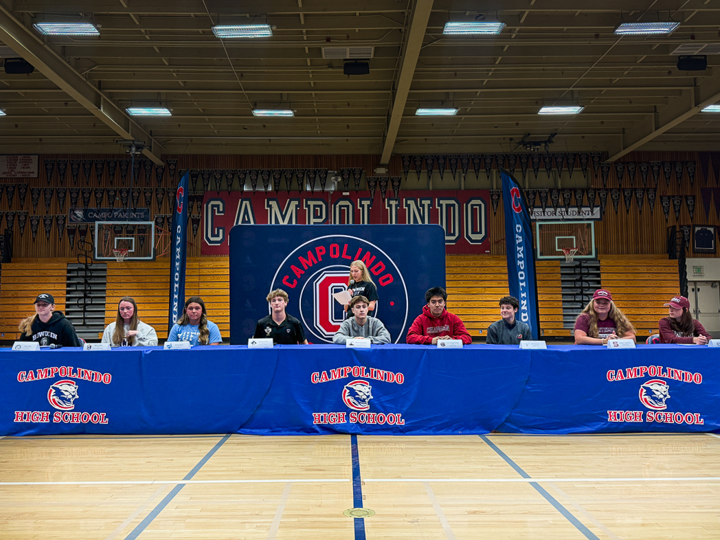 athletes sign to play college sports at NLI signing day